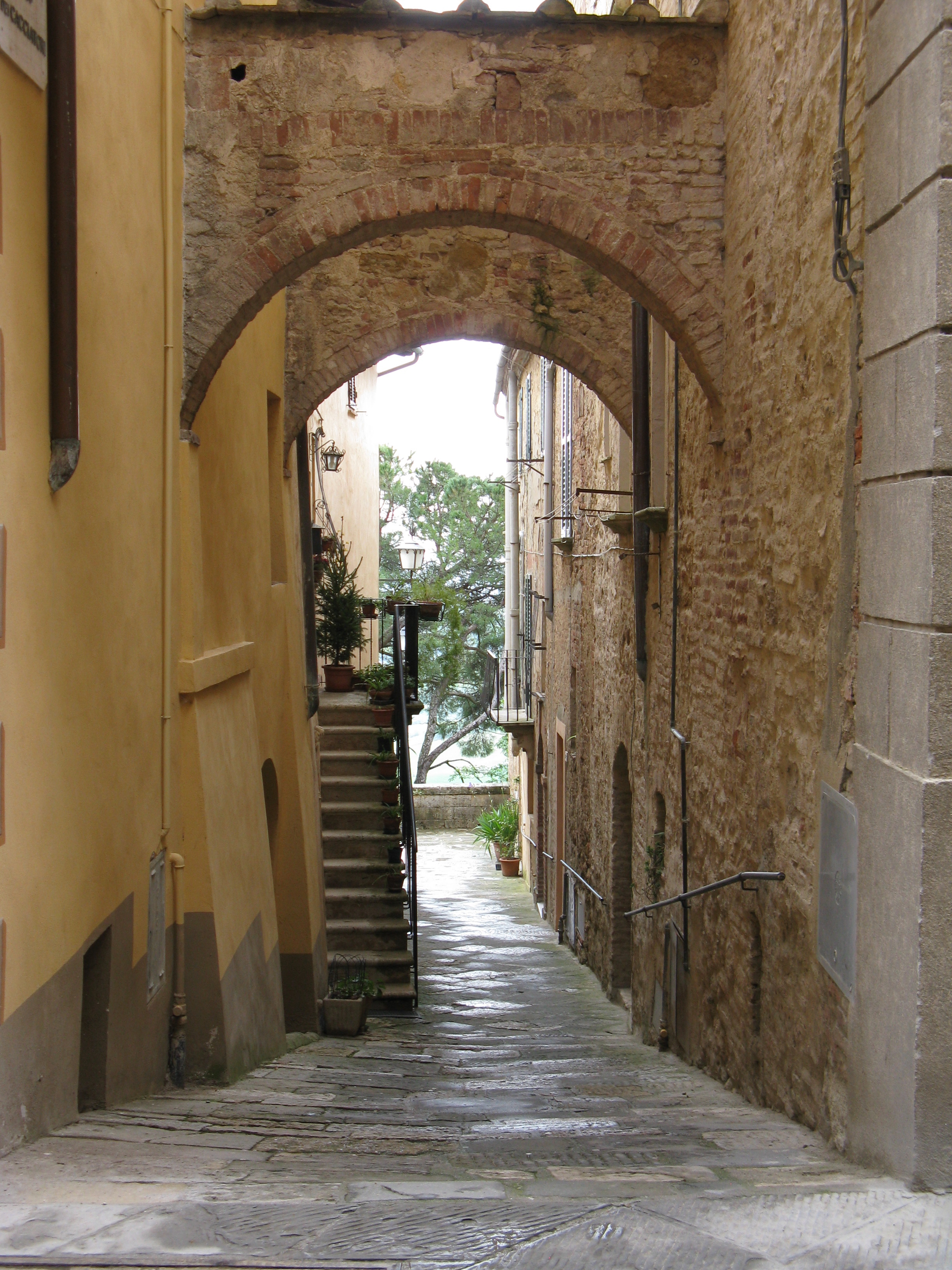Exploring a narrow alley in Montepulciano